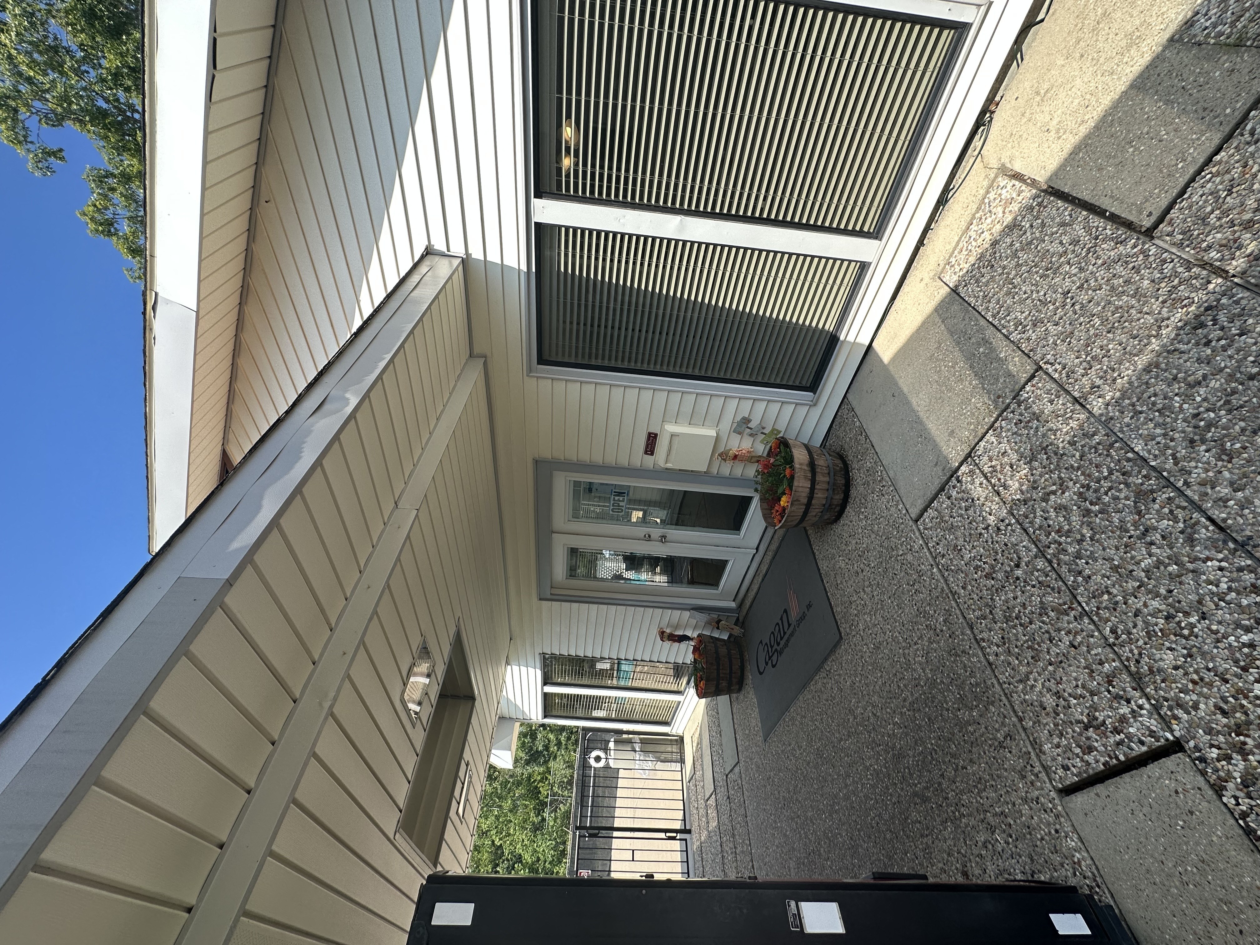 a view from the top of a building of an apartment building with a balcony and an air
