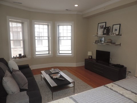 a living room with a couch and a coffee table