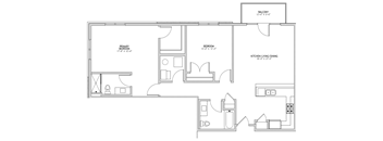 A floor plan of a house with a primary bedroom, a secondary bedroom, and a kitchen/living/dining area.