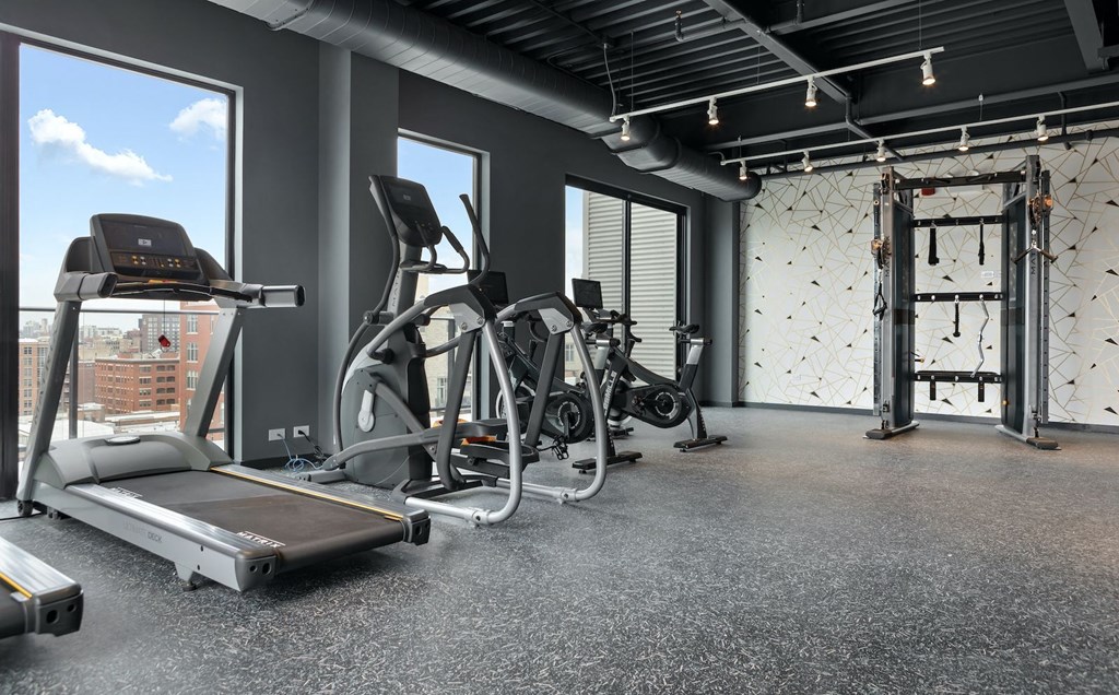 the gym has a slew of exercise equipment in it