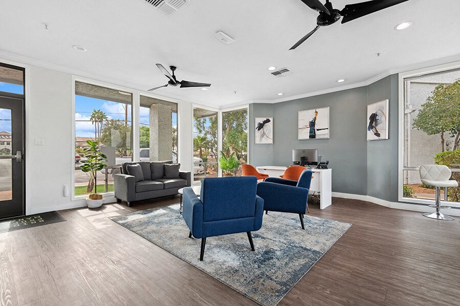 Community Clubhouse with Lounge Furniture at Crystal Creek Apartments in Phoenix, AZ.