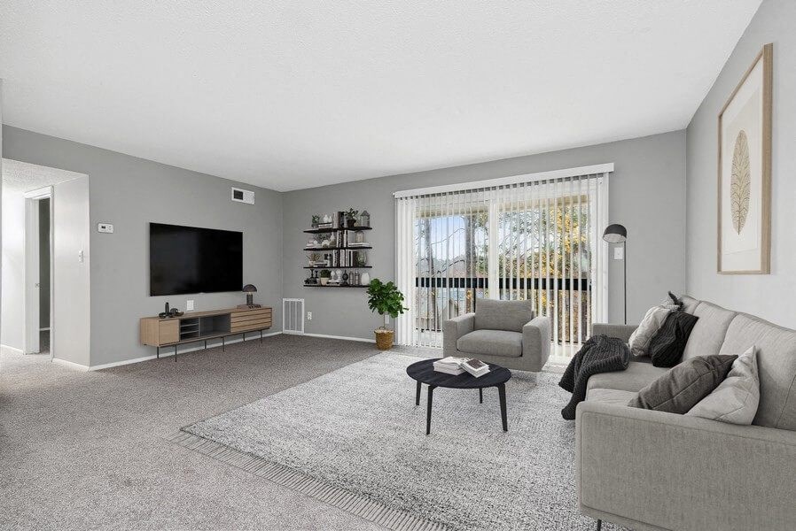Model living room with sliding glass door