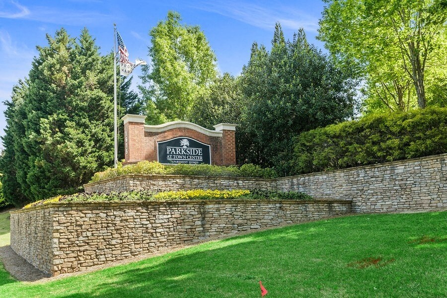 Property entrance sign and landscape