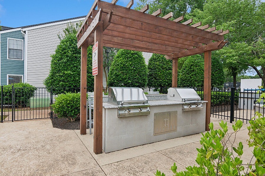 Outdoor BBQ Area with Canopy at Park 2300 Apartments in Charlotte, NC.