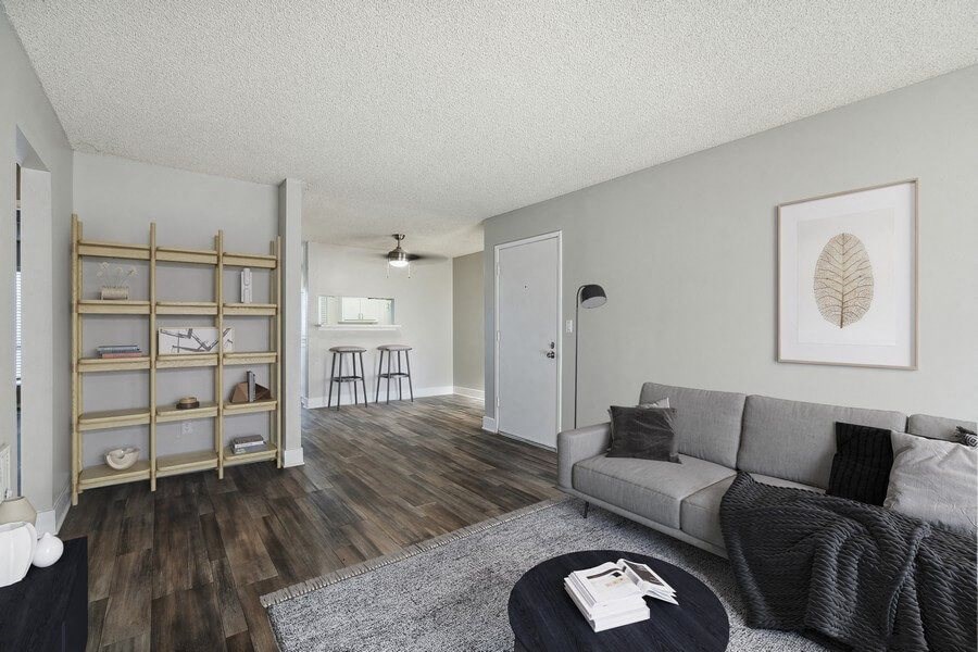 Model living room with view of kitchen bar