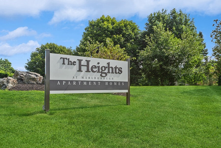 Monument Sign and Front Entrance at Heights Marlborough Apartments in Boston, MA.