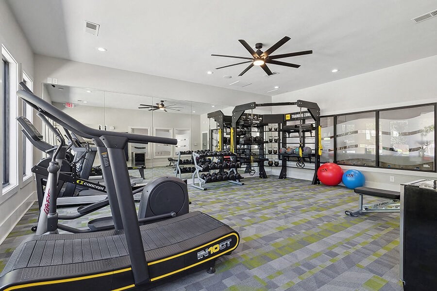 Community Fitness Center with Equipment at Retreat at Stonecrest Apartments located in Lithonia, GA.