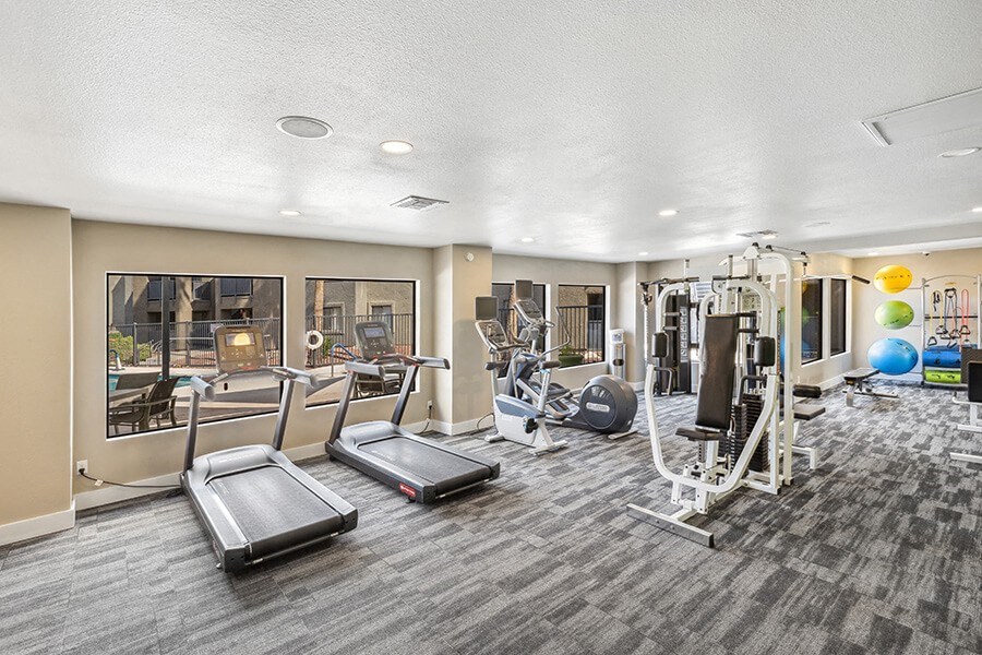 Community Fitness Center with Equipment at Saddle Ridge Apartments in Tucson, AZ.