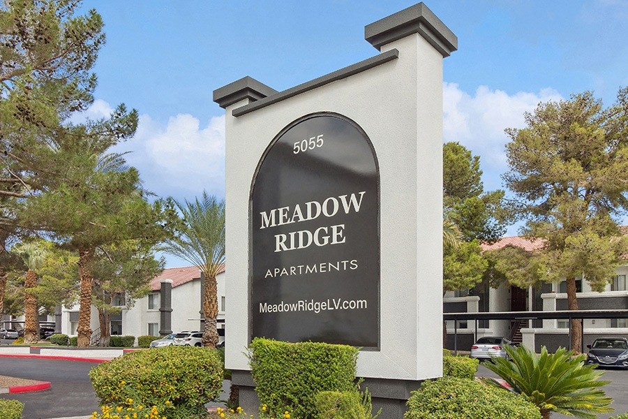 Monument Sign and Front Entrance at Meadow Ridge Apartments in Las Vegas, NV.