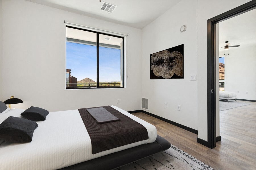 Model bedroom with queen-size bed