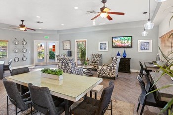 Resident clubhouse with table and chairs