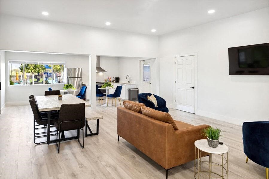 Resident clubhouse with a couch chairs and a table at Lakeside Casitas in Tucson, AZ