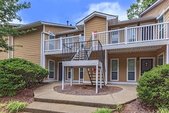 Apartment building exterior with private resident entrances