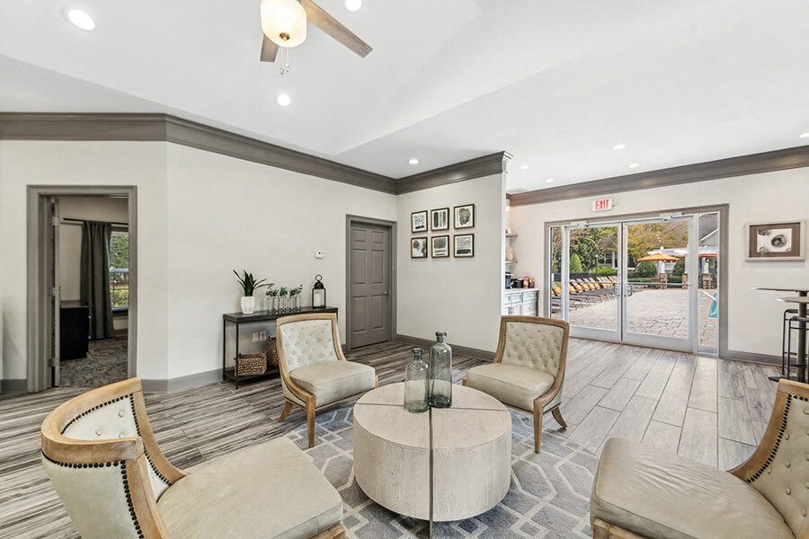 Community Clubhouse with Lounge Furniture at Lake Cameron Apartments located in Apex, NC.