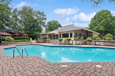 Community Swimming Pool with Pool Furniture at Park at Caterina Apartments located in Charlotte, NC.