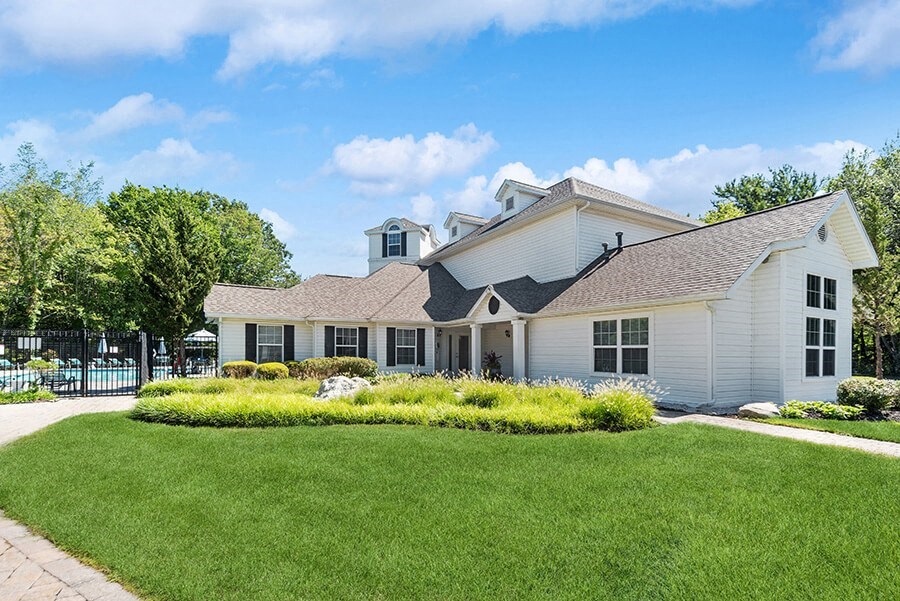 Community Clubhouse and Exterior at The Commons at Haynes Farm Apartments in Boston, MA.