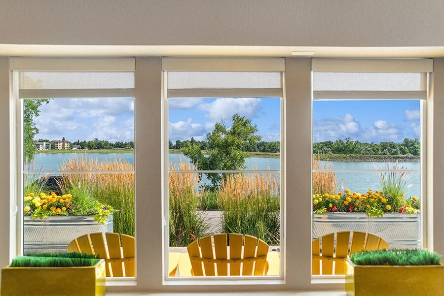 View of Community Lake at Waterfront Apartments in Lakewood, CO.