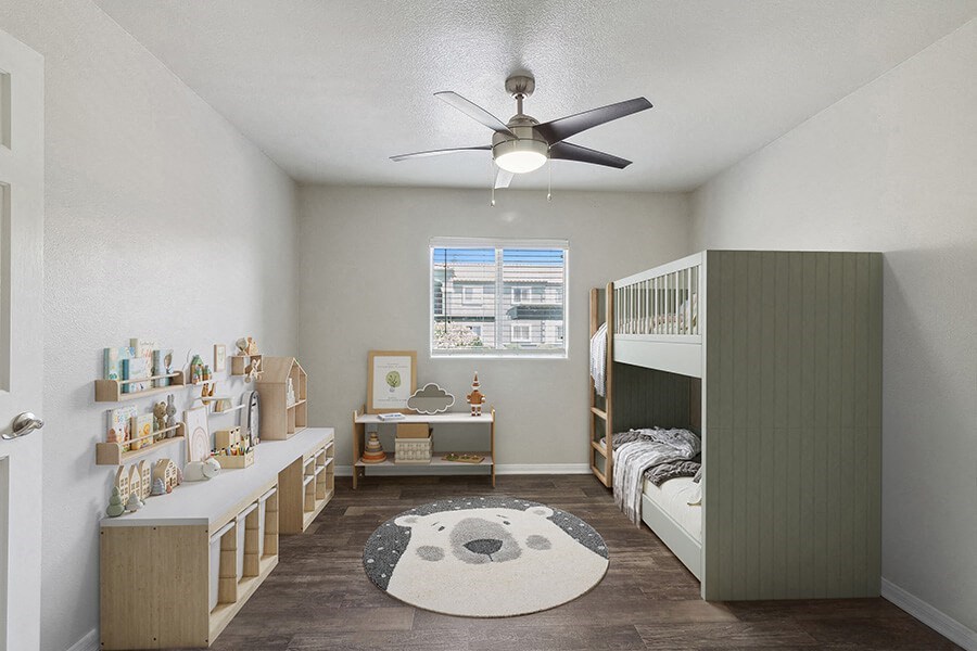 Model Bedroom with Wood-Style Flooring and Window View at Loma Vista Apartments in Las Vegas, NV.