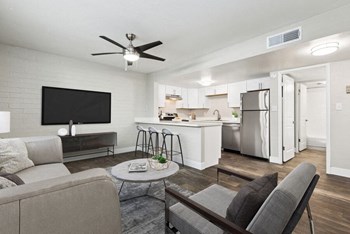 Model living room showcasing large open spaces - Photo Gallery 5