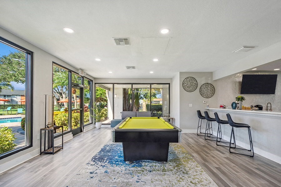 Community Clubhouse Pool Table Area at Bridges at Bayside Apartments in St. Petersburg, FL.