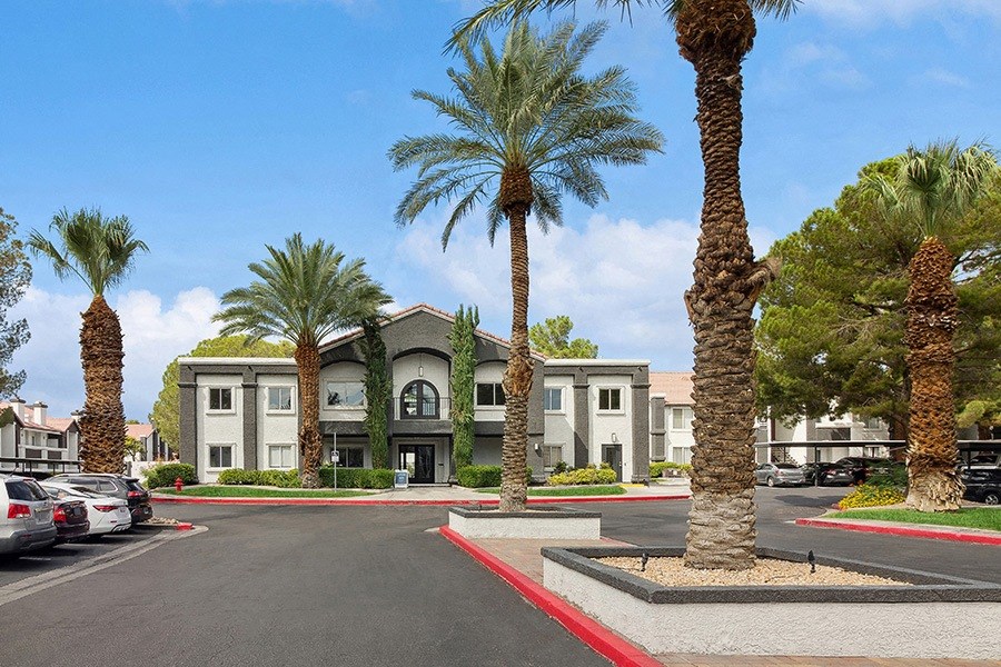 Exterior Community Building and Landscape at Meadow Ridge Apartments in Las Vegas, NV.