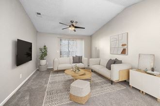 Model living room showcasing open living areas