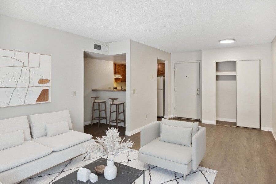 Mode living room with view of kitchen