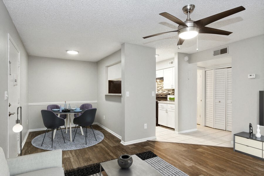 Model living room with view of dining room