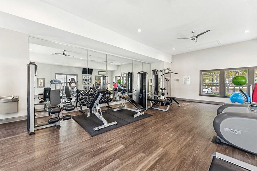 Community Fitness Center with Equipment at Lake Cameron Apartments located in Apex, NC.