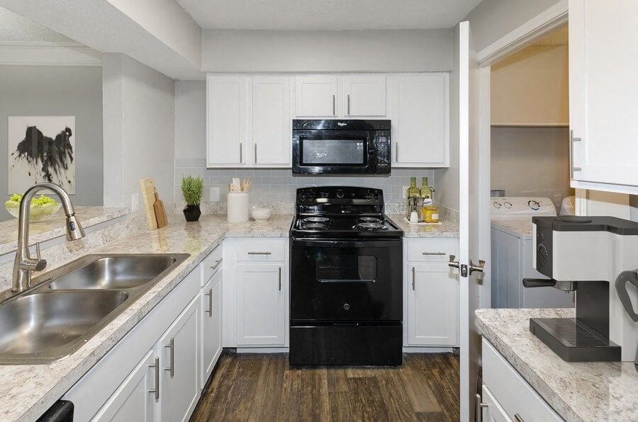 Model kitchen showcasing new appliances at Cobblestone, Arlington, Texas