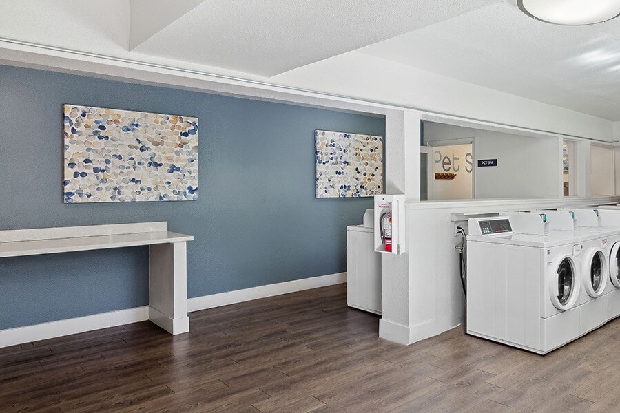 Community Laundry Center at Los Gatos Landing Apartments located in San Jose, CA.