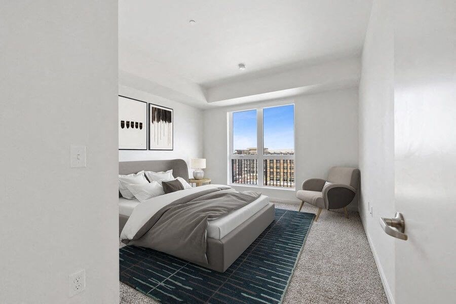 Model bedroom with walk-out balcony