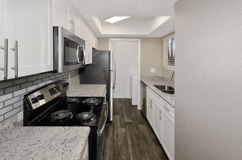Model kitchen showcasing wood inspired flooring - Photo Gallery