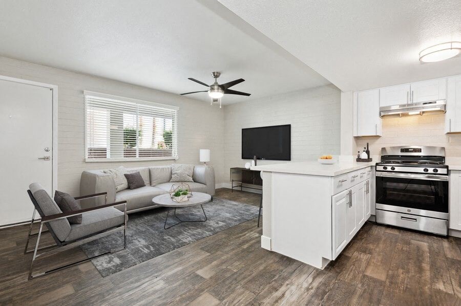 Model living room and kitchen showcasing open living space