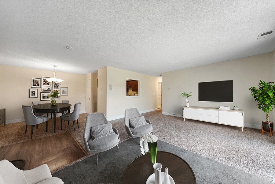 Model Living Room and Dining Room Area with Carpet at Meadows at Marlborough Apartments in Boston, MA.
