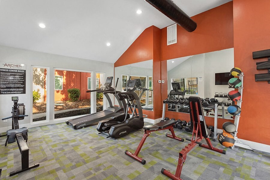 Community Fitness Center with Equipment at The Archer Apartments in Sacramento, CA.