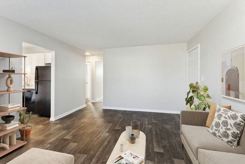 Model living room with view of kitchen - Photo Gallery