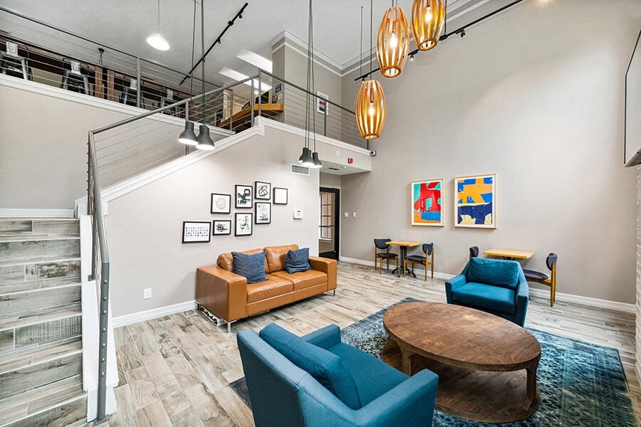 Community Clubhouse with Upstairs at Dallas North Park Apartments in Dallas, TX.