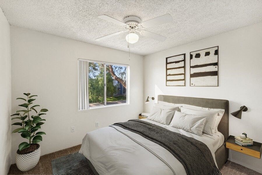 Model classic apartment bedroom with window and ceiling fan