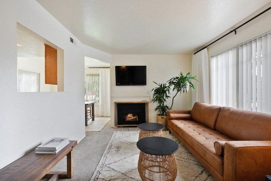 Model living room showcasing fireplace