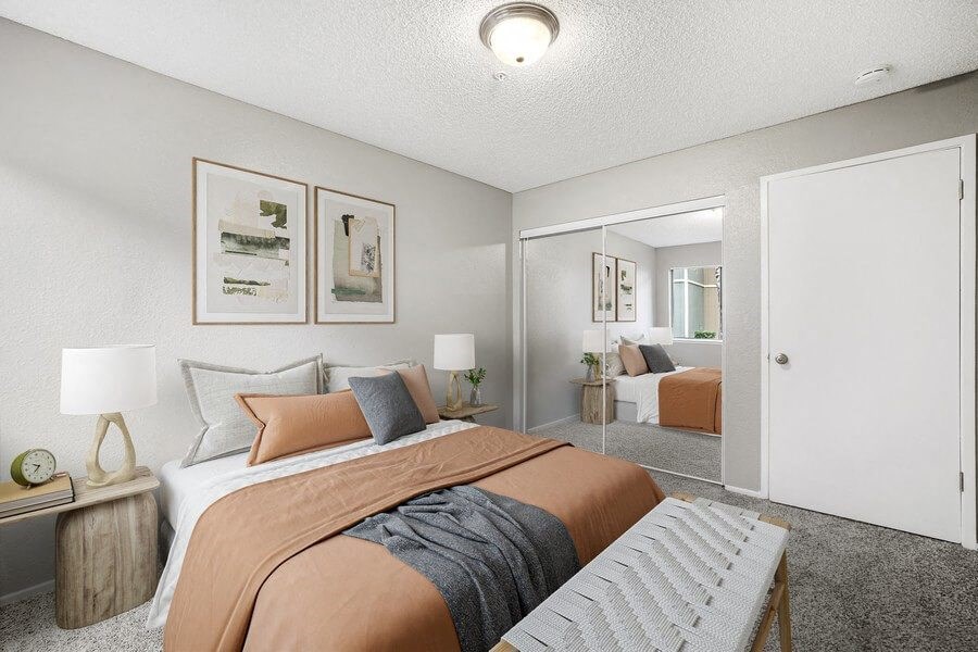 Model bedroom with queen-sized bed