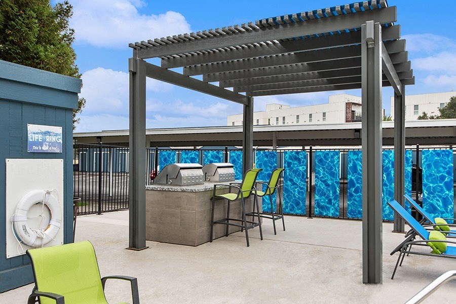 Outdoor BBQ Area with Furniture at Meritage Apartments in Vallejo, CA.