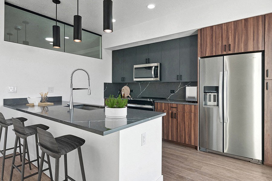 Model kitchen at Post House South located in Post District Residences in downtown Salt Lake City, Utah