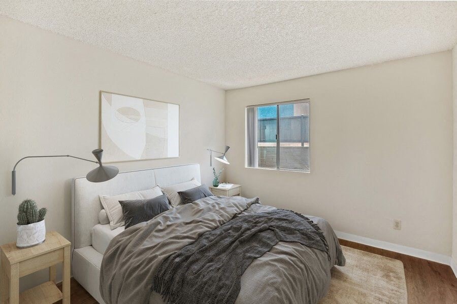 Model bedroom with wood-style vinyl flooring