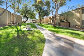 Pathway through the community with large shade trees