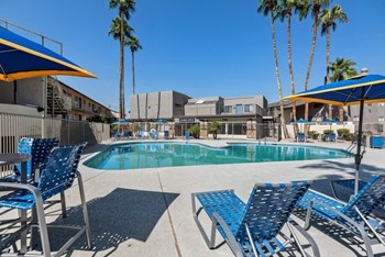 Poolside lounge chairs and cabanas