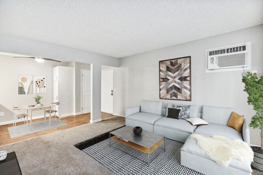 Model living room with view of dining