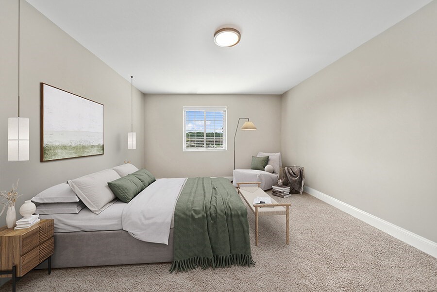 Model Bedroom with Carpet and Window View at Heights at Marlborough Apartments located in Marlborough, MA.