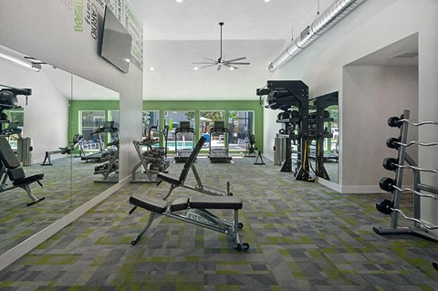 Community Fitness Center with Equipment at Overlook Apartments located in Salt Lake City, UT.