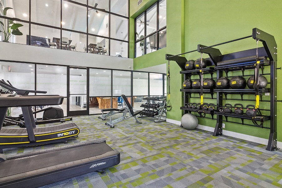 Community Fitness Center with Equipment at Meadow Ridge Apartments located in Las Vegas, NV.
